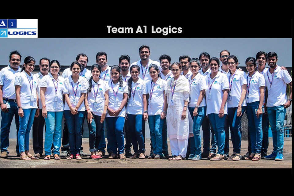 The full A1 Logics team photographed outside the Mangalore office
